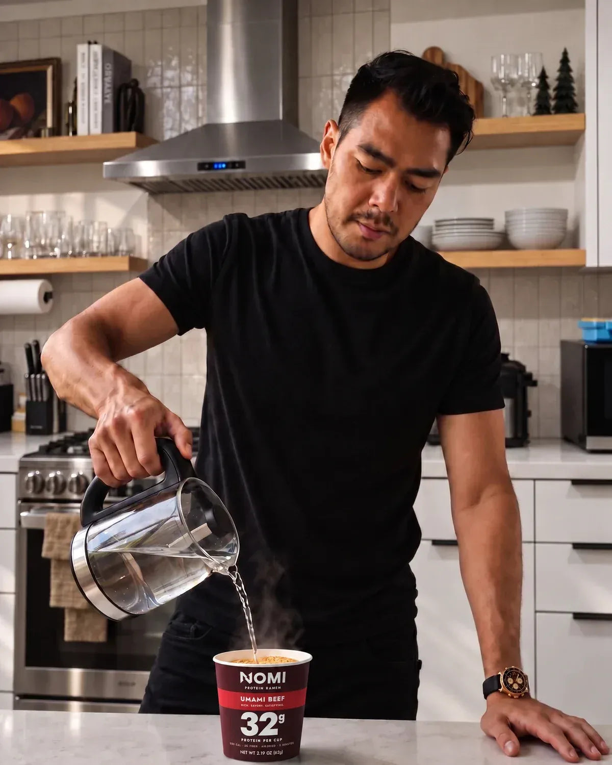 Alain today, pouring hot water into a NOMI Umami Beef cup